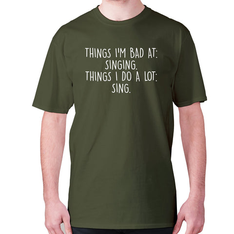 Things I'm bad ad singing. Things I do a lot sing - men's premium t-shirt - Graphic Gear